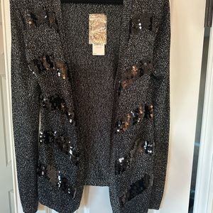 Selling a NEW Holiday Cardigan Dana Bachman size Large with tags